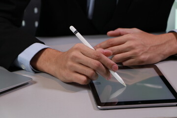 business people working on tablet computer