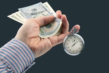mechanical stopwatch and dollars in man hand. Part time accuracy for business. business and finance...