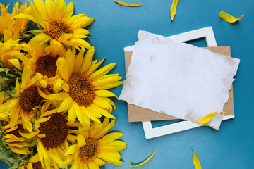 postcard layout. bouquet of sunflowers on a white background and space for text