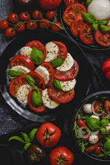 Salads with traditional italian burrata and mozzarella cheese with arugula and tomatoes