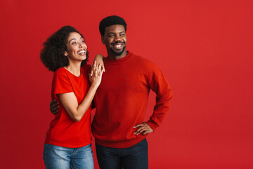 Fototapeta premium Black happy man and woman smiling and looking aside