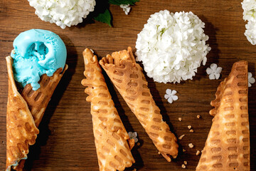 Turquoise ice cream in waffle cones