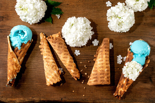Turquoise ice cream in waffle cones