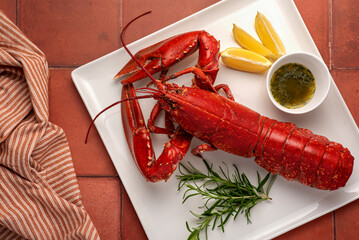 Food photography of lobster, seafood, lemon, sauce, rosemary