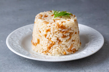 Traditional delicious Turkish food; Turkish style rice pilaf (Turkish name; Arpa sehriyeli pirinc pilavi)