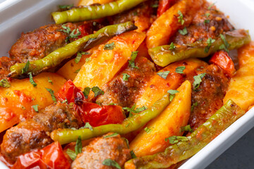 Traditional Homemade Turkish Food Kofte - Kofta with Tomato Sauce and Potatoes. (Turkish name; Izmir kofte)