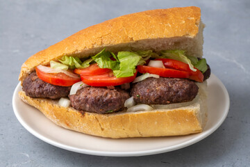 Delicious Turkish Meatballs Sandwich, Kofte Ekmek. Turkish name; kofte ekmek or ekmek arasi kofte