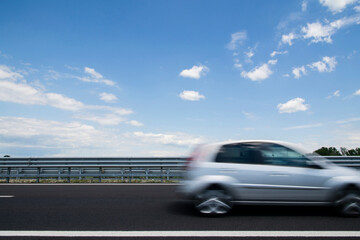 Fototapeta na wymiar Traveling on the highway by car