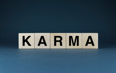 Karma. Cubes form the word Karma