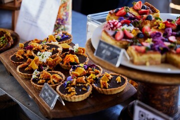 Fototapeta premium Closeup shot of fruit pastries in a food market in Cape Town, South Africa