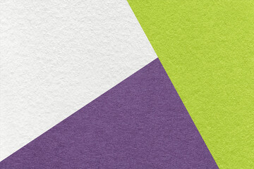 Texture of craft white, green and violet shade color paper background, macro. Structure of vintage abstract cardboard