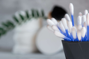 Cotton buds blue color close-up, macro photo, care products for women, the concept of skin cleansing