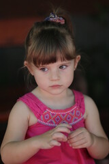 portrait of a little child in a pink dress in sofia 
