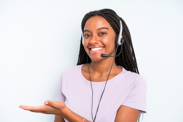 black pretty woman smiling cheerfully, feeling happy and showing a concept. telemarketer concept