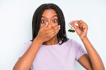 black pretty woman covering mouth with hands with a shocked. new car concept