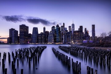 Old Pier 1 Park in Brooklyn, New York City with a gorgeous purple sky overhead during evening