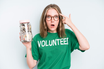 caucasian pretty woman feeling shocked and scared. donation and volunteer concept
