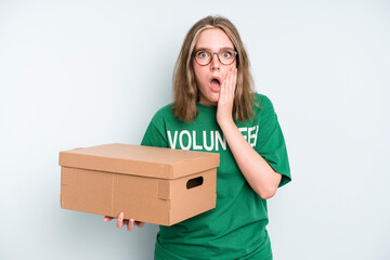 caucasian pretty woman amazed, shocked and astonished with an unbelievable surprise. volunteer and...