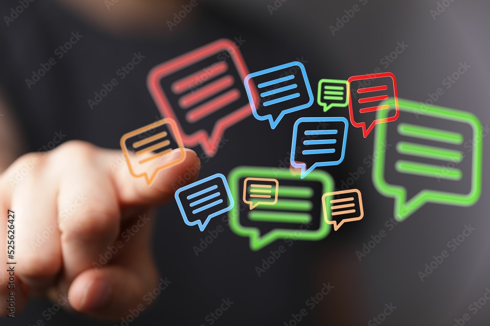 Poster hand pointing to colorful digital message symbols with a finger