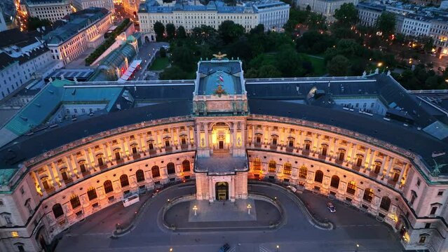 aerial view of Vienna at night, classic royal palace of Hofburg with night illumination, downtown Vienna after sunset, tourism in Austria