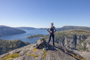 Woman on Mountain trip to Gravtind on a beautiful sunny day, Hongset, Velfjord,Helgeland,Nordland ,Norway,scandinavia,Europe