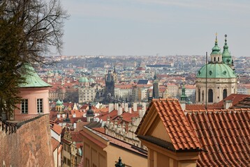 Cityscape of Prague with the St. Francis of Assisi church in the Czech Republic on a cloudy day
