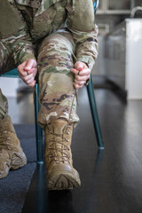 Air Force service member gets ready for work and leaves.
