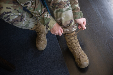 Air Force service member gets ready for work and leaves.