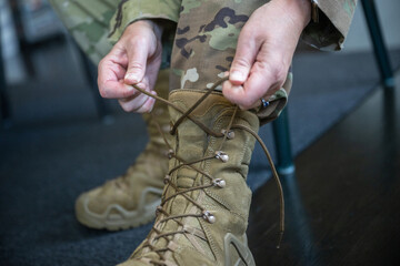 Air Force service member gets ready for work and leaves.