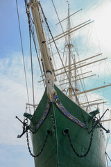 Steel sailing boat clipper windjammer freighter ship Rickmer Rickmers against blue sky with white...