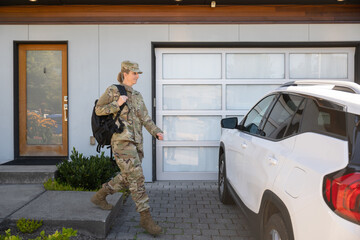 Naklejka premium Air Force service member gets ready for work and leaves.
