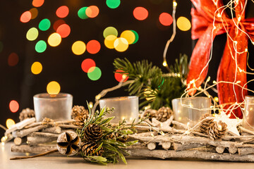 Close up of balls on christmas tree. Bokeh garlands in the background. New Year concept.
