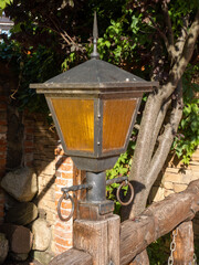 ship lantern against the background of trees, iron
