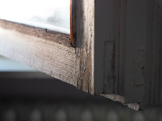 Old wooden window, close-up. Ruined wooden window.