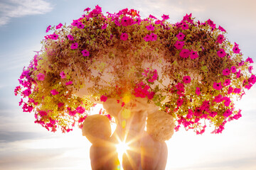 Sunrays between cherubins and flowers vase pot, Paris, France - obrazy, fototapety, plakaty