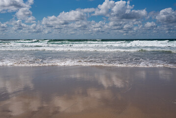 beach and sea clouds sky blue azure cornwall england coast reflection