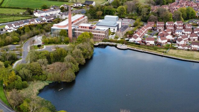 Aerial view of the Mossley Mill near the Mossley Dam in Northern Ireland