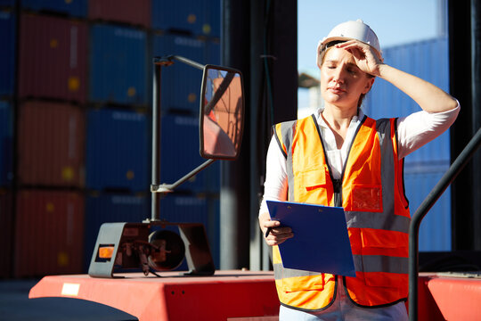 Factory Workers Or Engineer Feeling Tired For Working In Containers Warehouse Storage