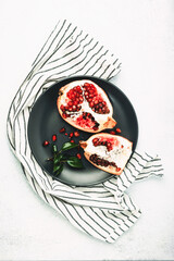 Open red garnet on a plate