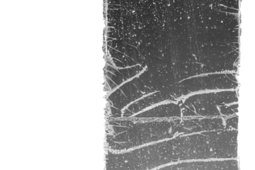 Strip of tape adhesive on a glass surface after being pulled.  