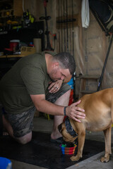 Marine veteran with service dog and family living life.