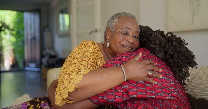 MS SLO MO Grandmother hugging granddaughter (14-15)