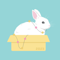 Vector white rabbit in a box with the inscription 2023 with a garland. Happy New Year and Merry Christmas. The year of the rabbit is 2023.