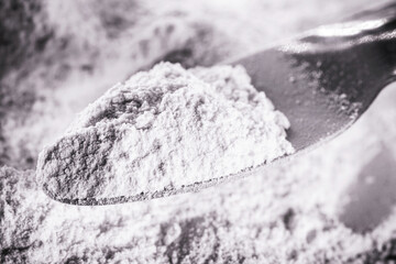 Phosphate, pile of phosphorous powder, used as a fertilizer or compost, for soil correction, or phosphating. Isolated background with copyspace - obrazy, fototapety, plakaty