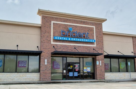 Brident Dental And Orthodontics Office Building Exterior In Houston, TX. Health And Wellness Local Business Chain.	