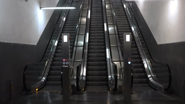 Electric escalator in metro. Moving staircase.