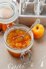 A jar of homemade peach jam.