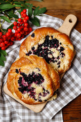 Traditional buns with blueberry filling.