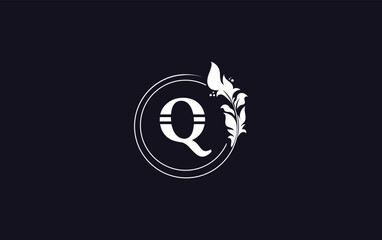 Golden leaf circle and creative logo design vector with the letters for professional brand and business Q