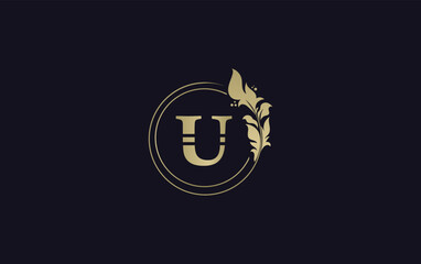 Golden leaf circle and creative logo design vector with the letters for professional brand and business U